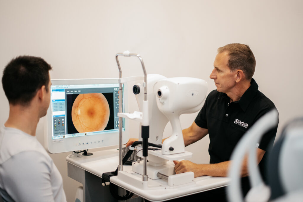 Doctor Guthrie consults with a patient using Optical Coherence Tomography